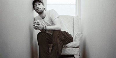 Chris in un concerto di beneficenza a Dicembre